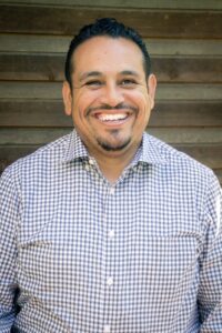 Photo of Executive Director Moises Roman